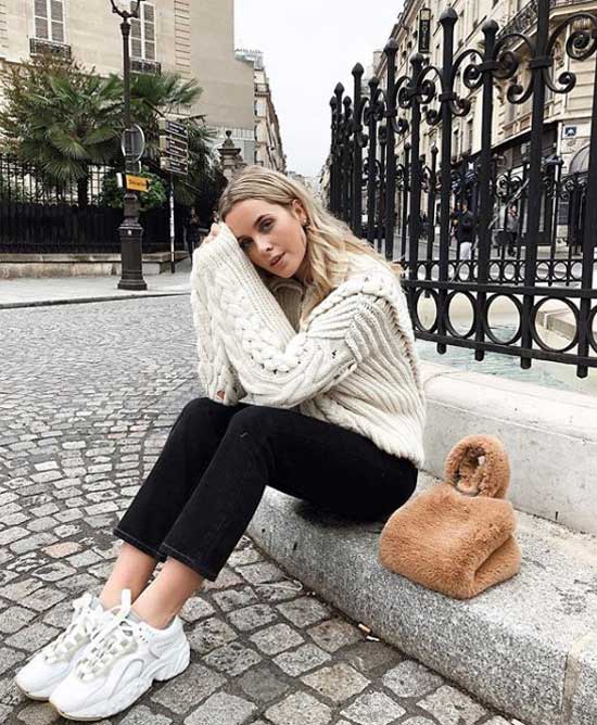 White sneakers with black jeans and white sweater