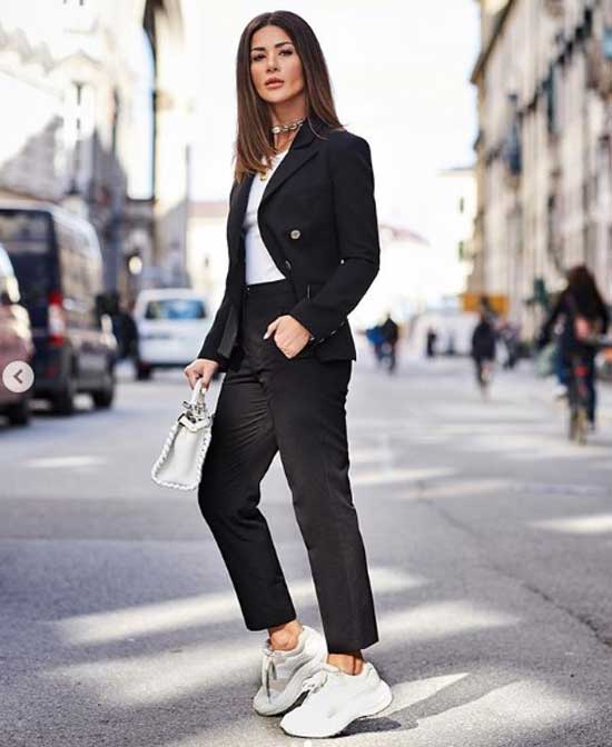 Black suit with white sneakers