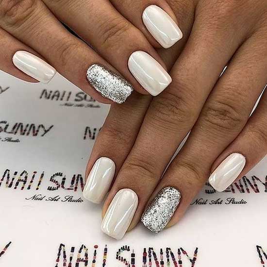 Light manicure with glitter shine