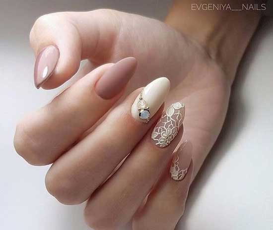 Light matte manicure with rhinestones