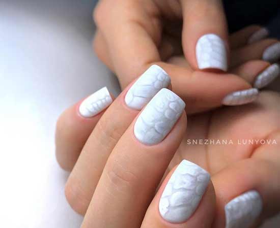 White manicure with nail art