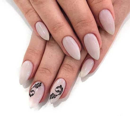 Design of two nails on a beige background