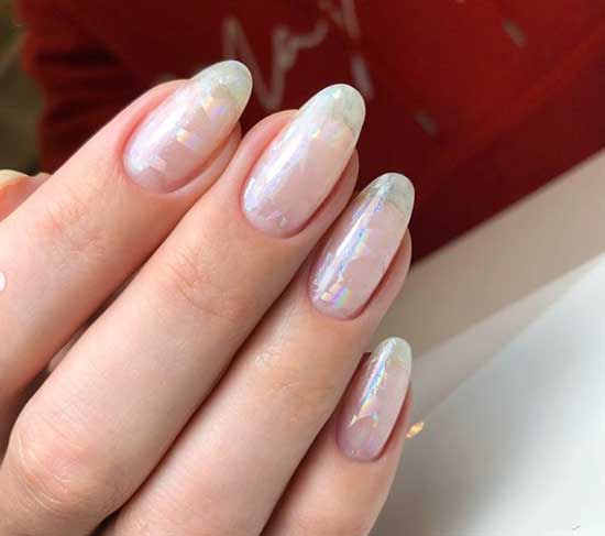 Delicate beige color of manicure with design