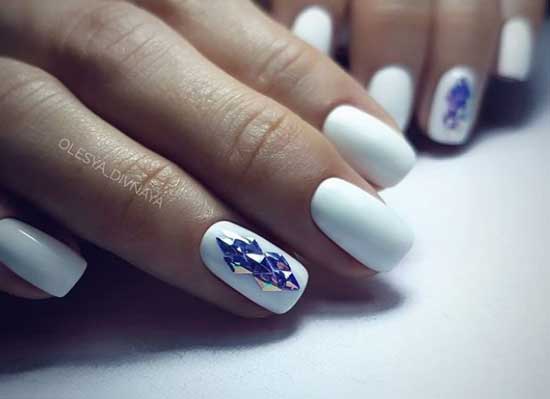 Snow-white manicure with decor