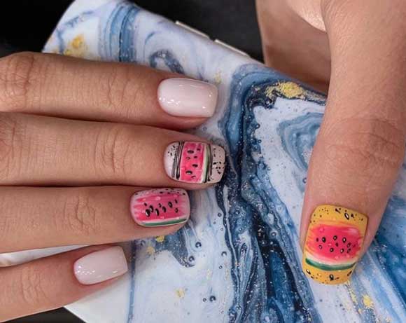 Pink with drawings design manicure