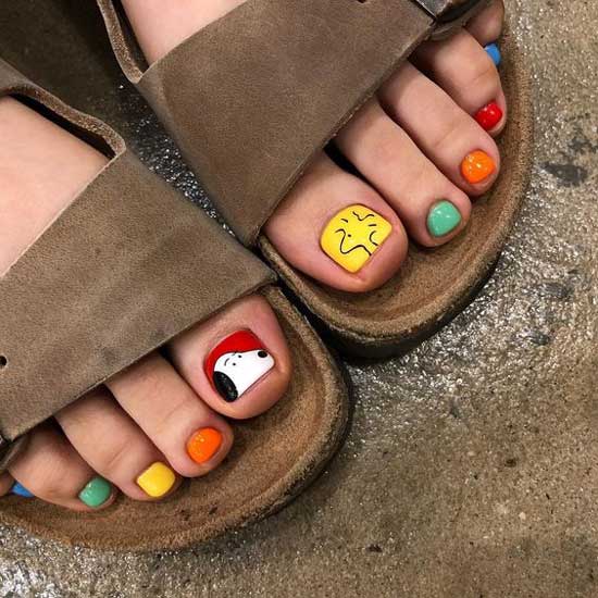 Multi-colored pedicure with a pattern 2019-2020