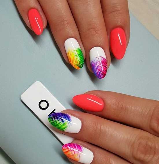 Bright manicure with a print in coral color