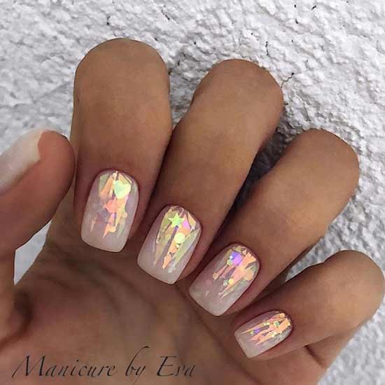 Pink manicure with broken glass foil