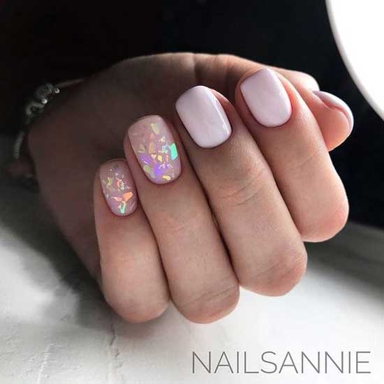 Light pink manicure with broken glass effect