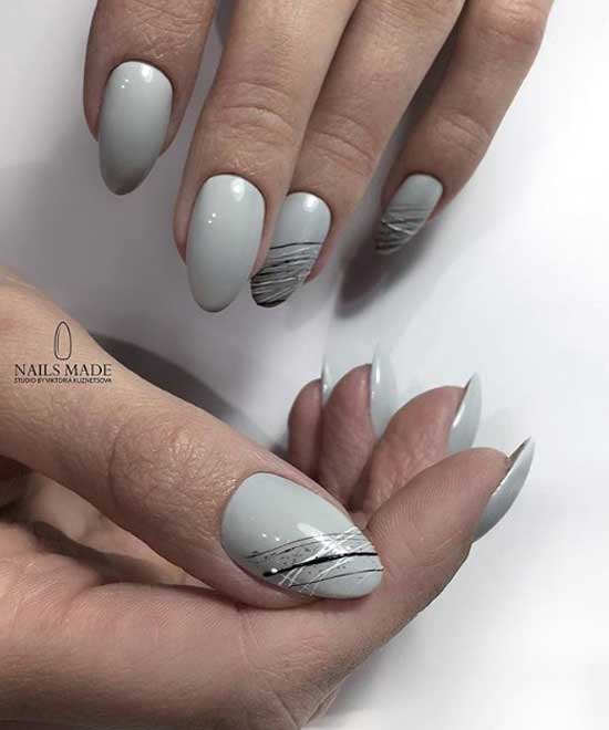 Classic manicure in gray tones with a minimum of decor