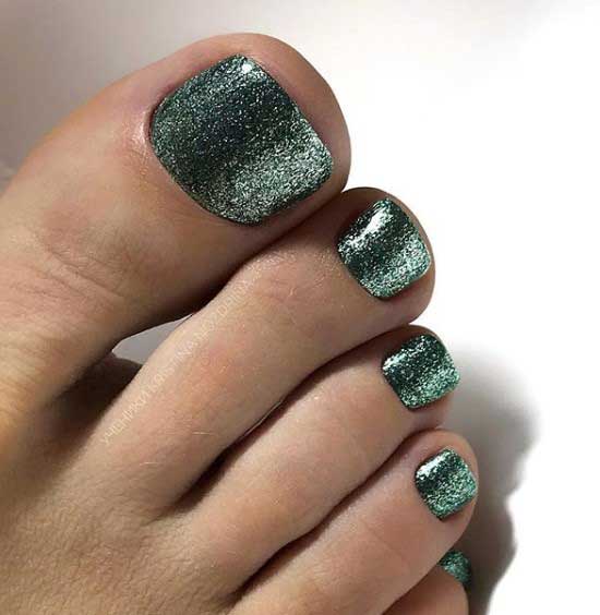 Plain green glitter pedicure