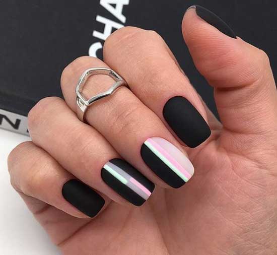 Matte black manicure with graphics