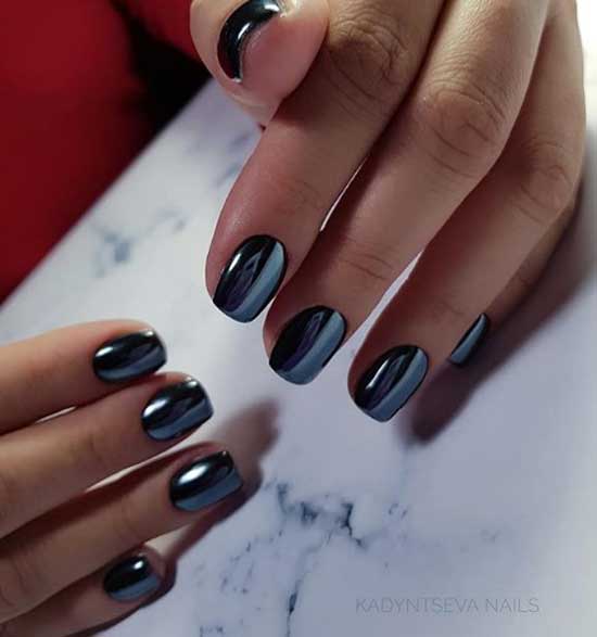 Manicure in dark colors with rubbing