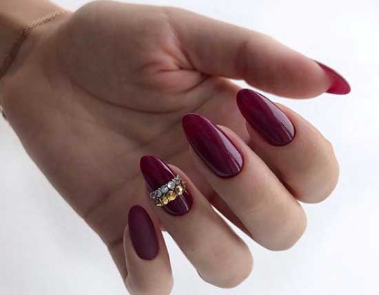 Burgundy manicure with rhinestones