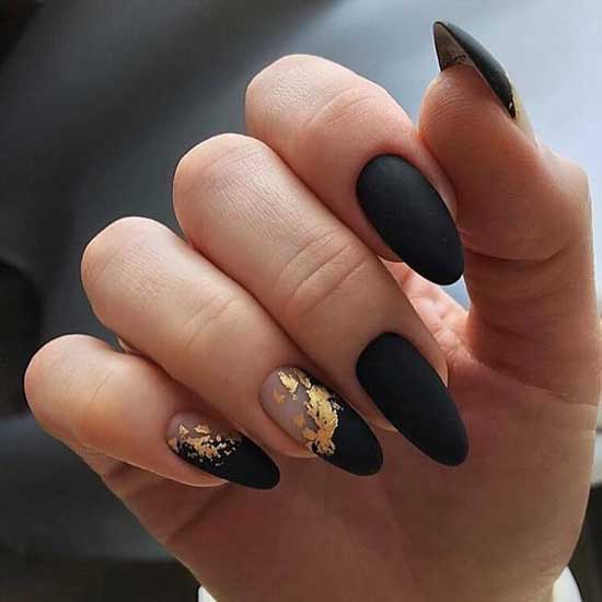 Black manicure with gold