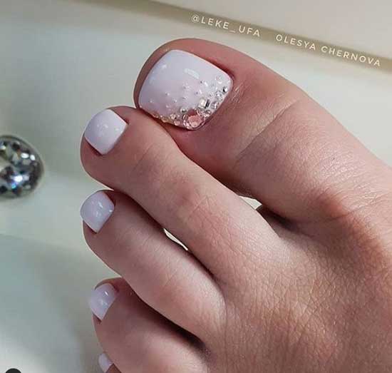 White pedicure with decor