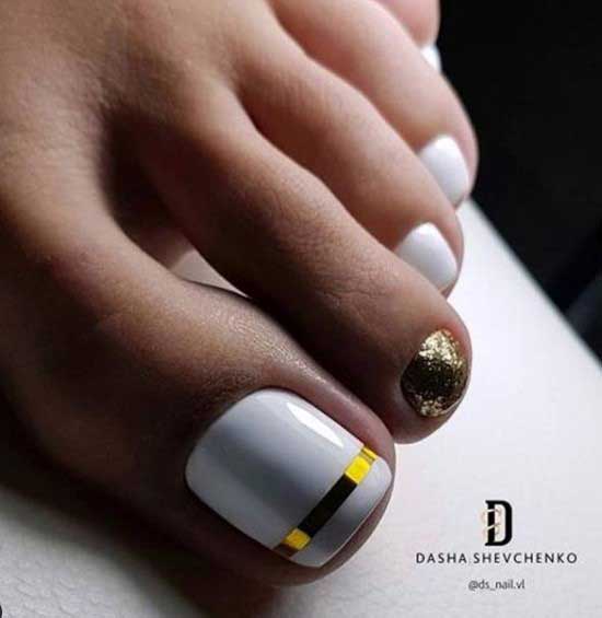 White pedicure with gold decor