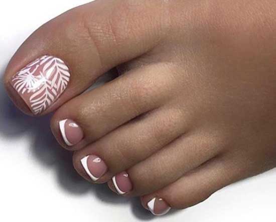 White pedicure with monograms