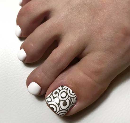 White pedicure with thumb accent