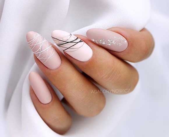 Almond-shaped manicure with Spider line gel paint