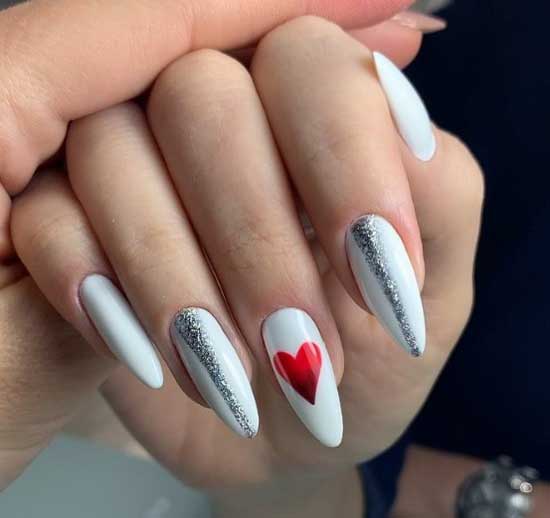 Almond shaped manicure with a heart