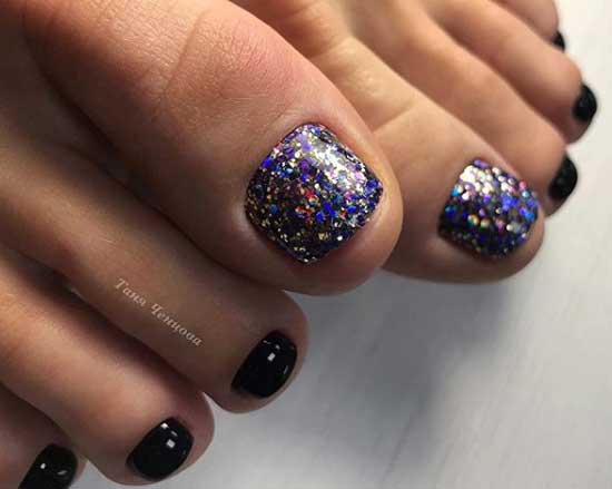 Pédicure à paillettes noires et bleues