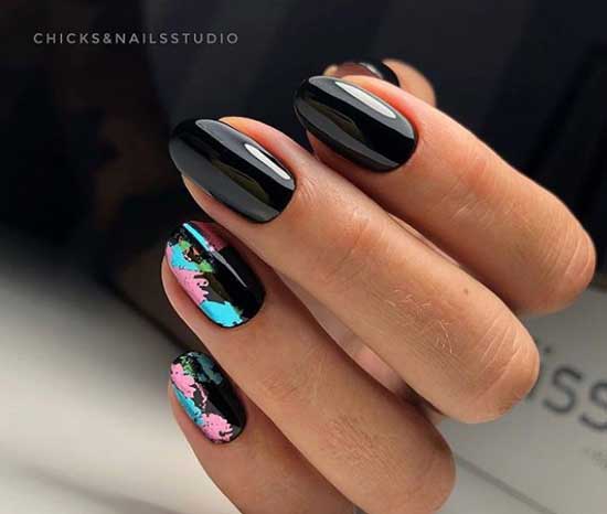 Black manicure and nail art with foil