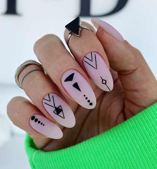 Light manicure with a combination of graphic elements