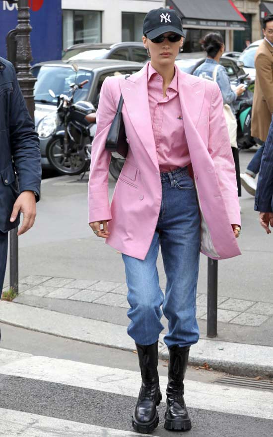 Bella Hadid in rough boots, jeans and a jacket