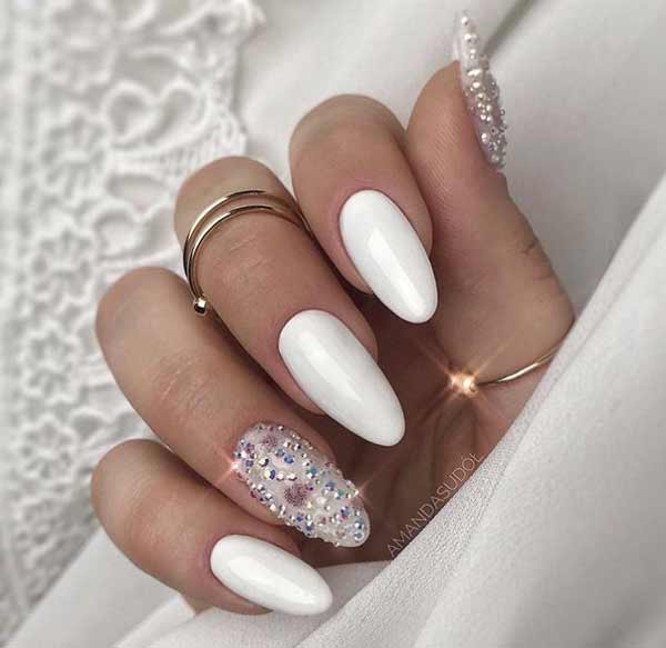 White beautiful manicure for the new year