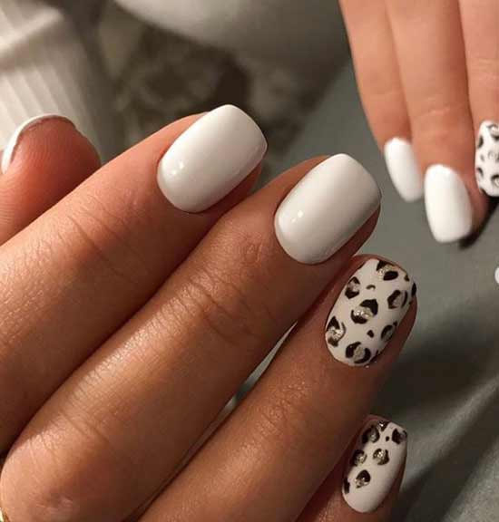 White manicure with leopard print