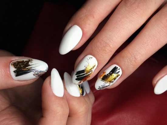 White manicure with gold foil