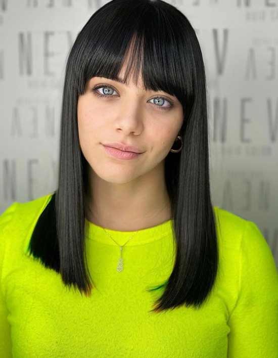 Fashionable haircut with bangs