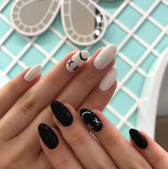 Black and white manicure on the left and right hand