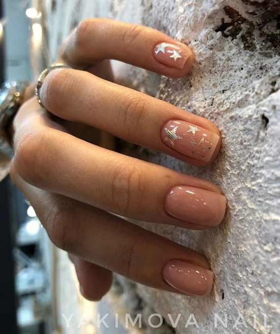 Beige and silver nail design