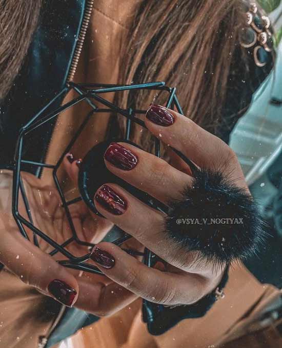 Beautiful burgundy color manicure