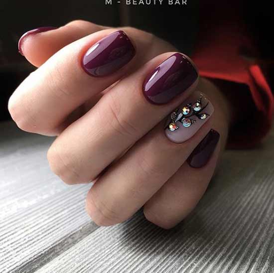 Beautiful burgundy manicure with rhinestones