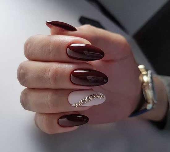 Burgundy with rhinestones manicure