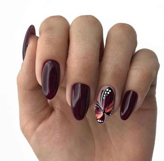 Burgundy nail design with a pattern to match