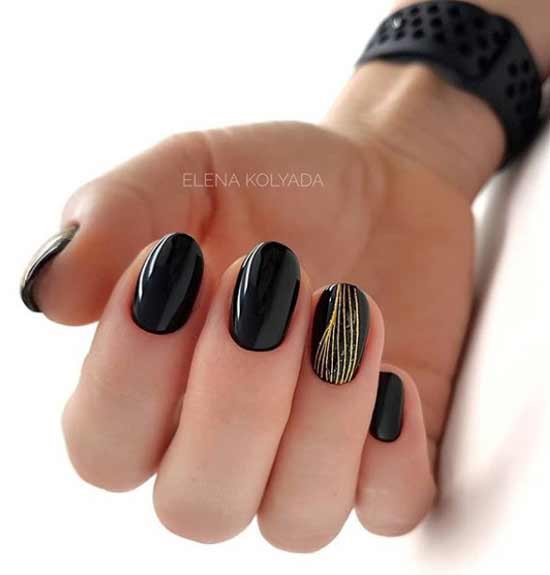 Black manicure with gold short length