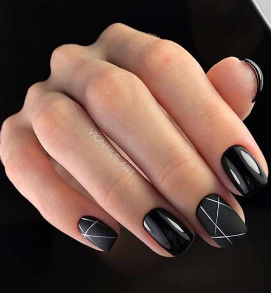 Black manicure design with graphic pattern