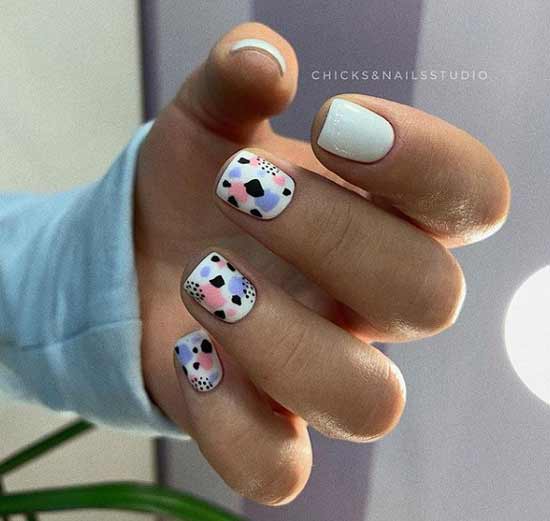 White manicure with a pattern for short nails