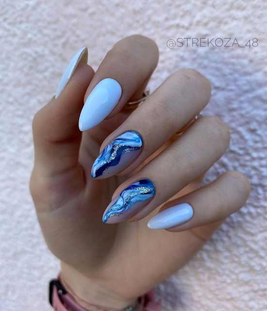 Blue manicure sharp nails