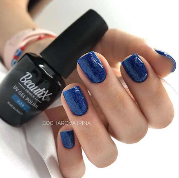 Shiny blue manicure