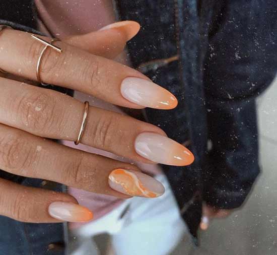 Delicate coral color of manicure