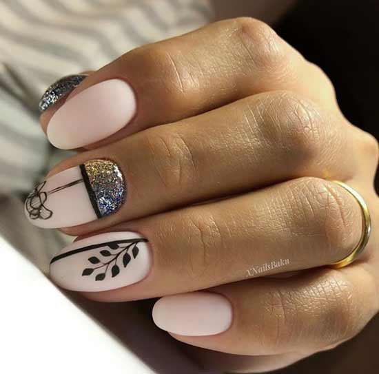 Delicate manicure with a pattern and sparkles