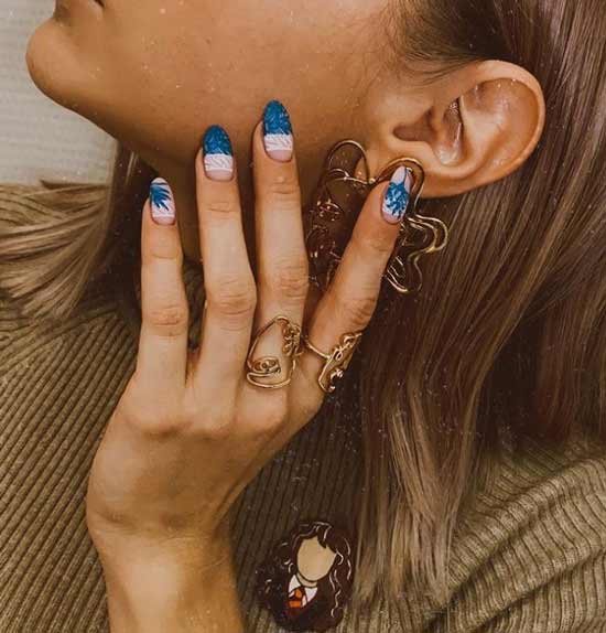 Blue manicure with a pattern