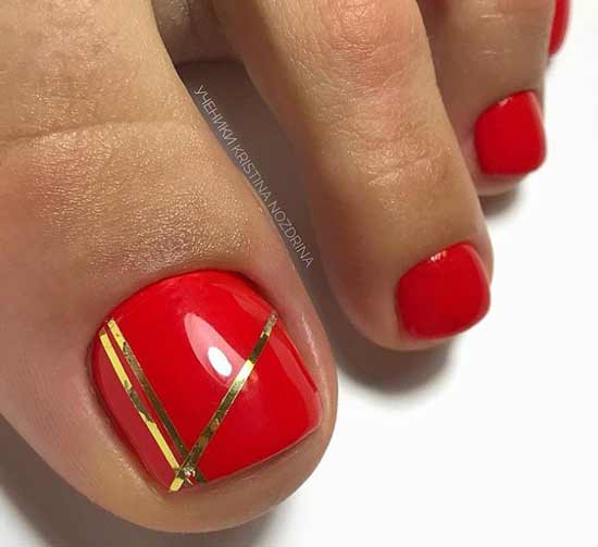 Red pedicure with gold