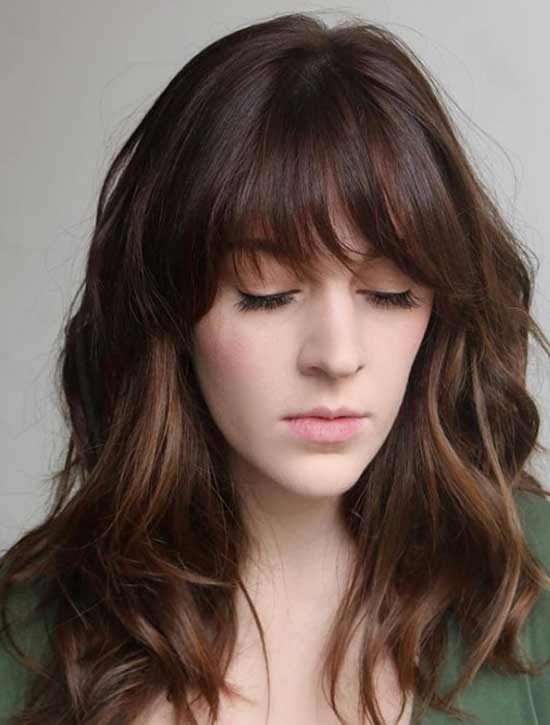 Stylish bangs below the eyebrows