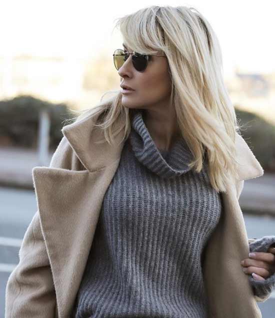 Frange à la mode avec une longue coupe de cheveux